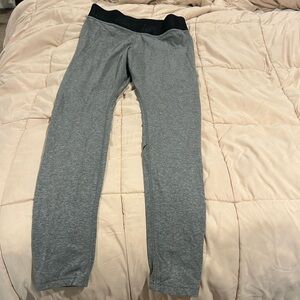 Nike leggings with Nike emblem on the back left leg